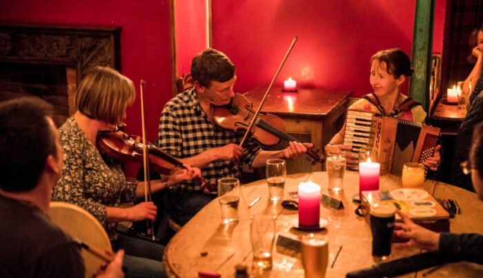 Musicians playing folk music in the pub, Inverness, Scotland